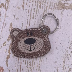 Schlüsselanhänger Teddybärenkopf braun-glitzer