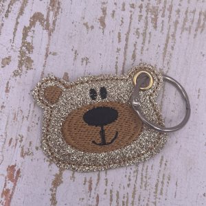Schlüsselanhänger Teddybärenkopf goldglitzer