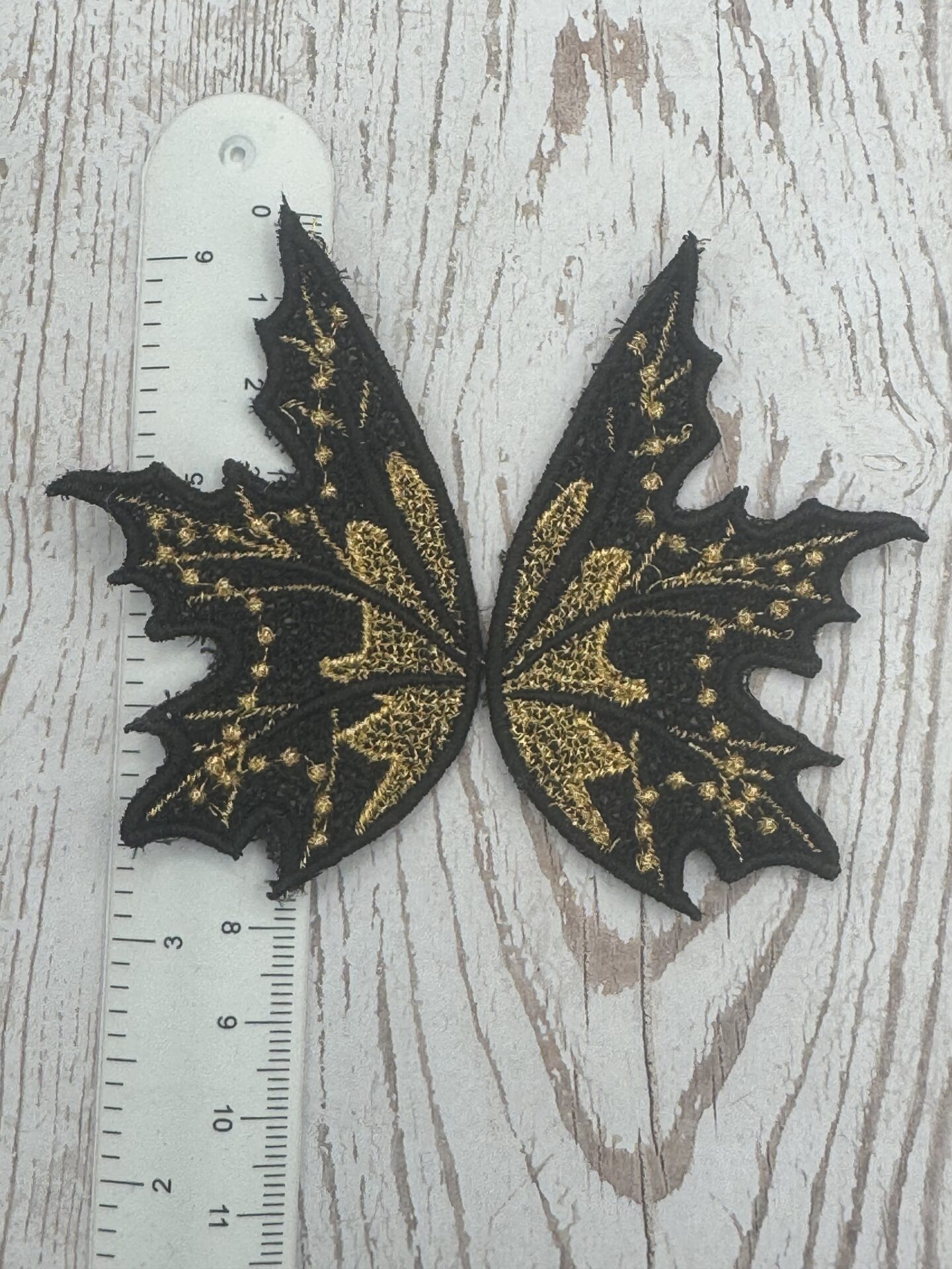 Flügel Schwarz / Gold 7,5 x 5 cm